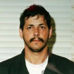 Fotografia zachytáva Marca Dutrouxa (1996) obvineného z vraždy štyroch detí a z pedofílie
